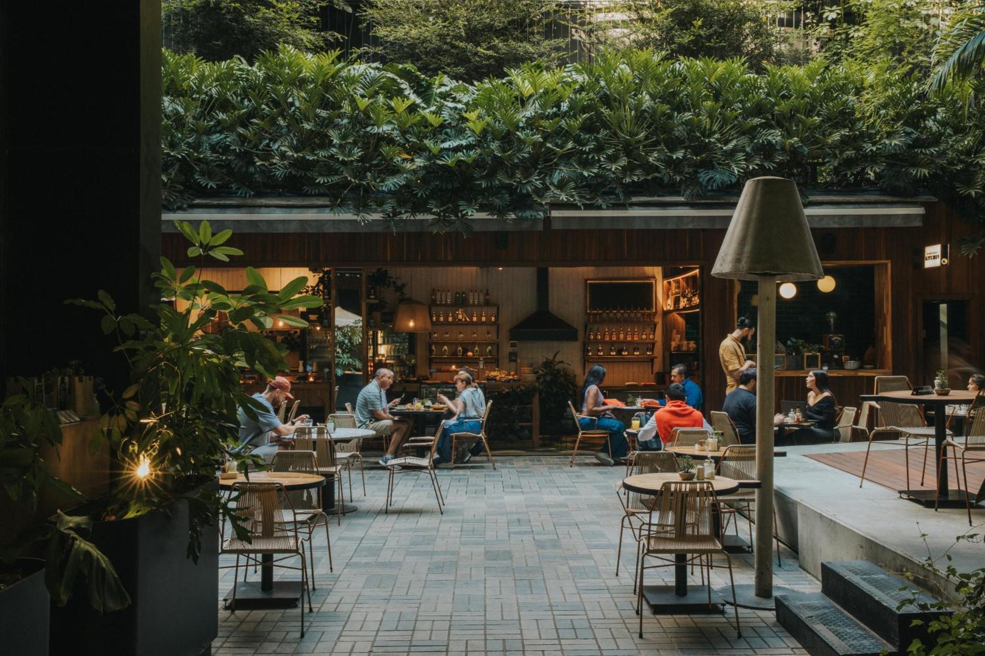 The Click Clack Hotel Medellín Exteriör bild The courtyard at the hotel
