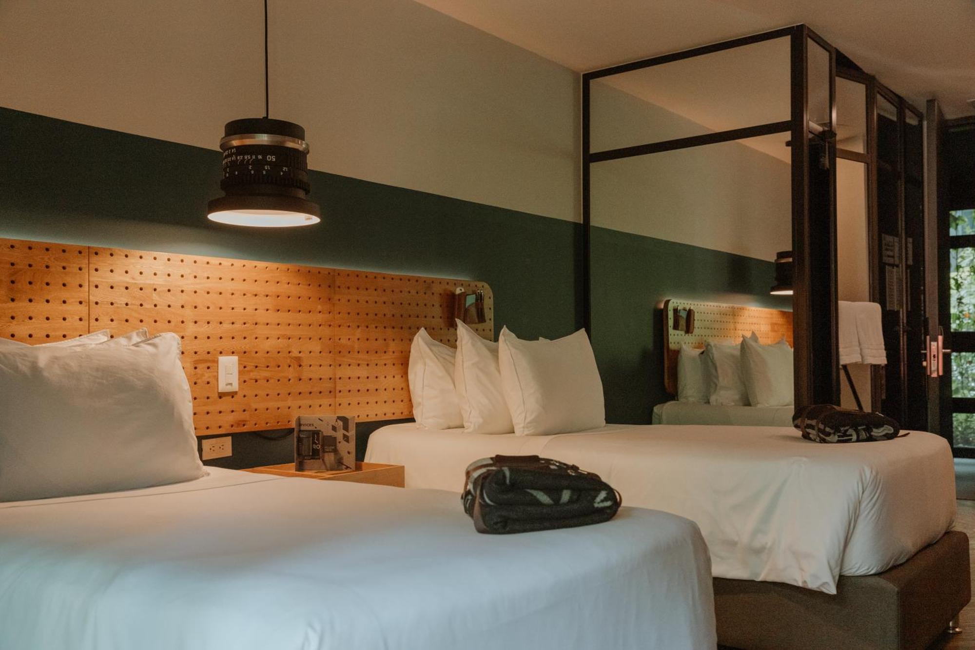 The Click Clack Hotel Medellín Exteriör bild A room at the Hotel 1728