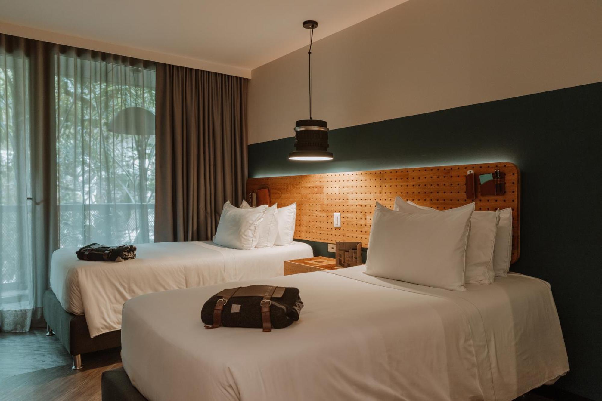 The Click Clack Hotel Medellín Exteriör bild A room at the hotel