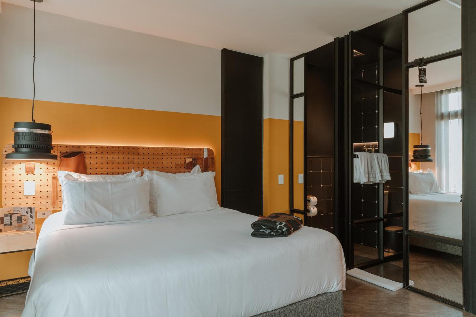 The Click Clack Hotel Medellín Exteriör bild A room at the hotel