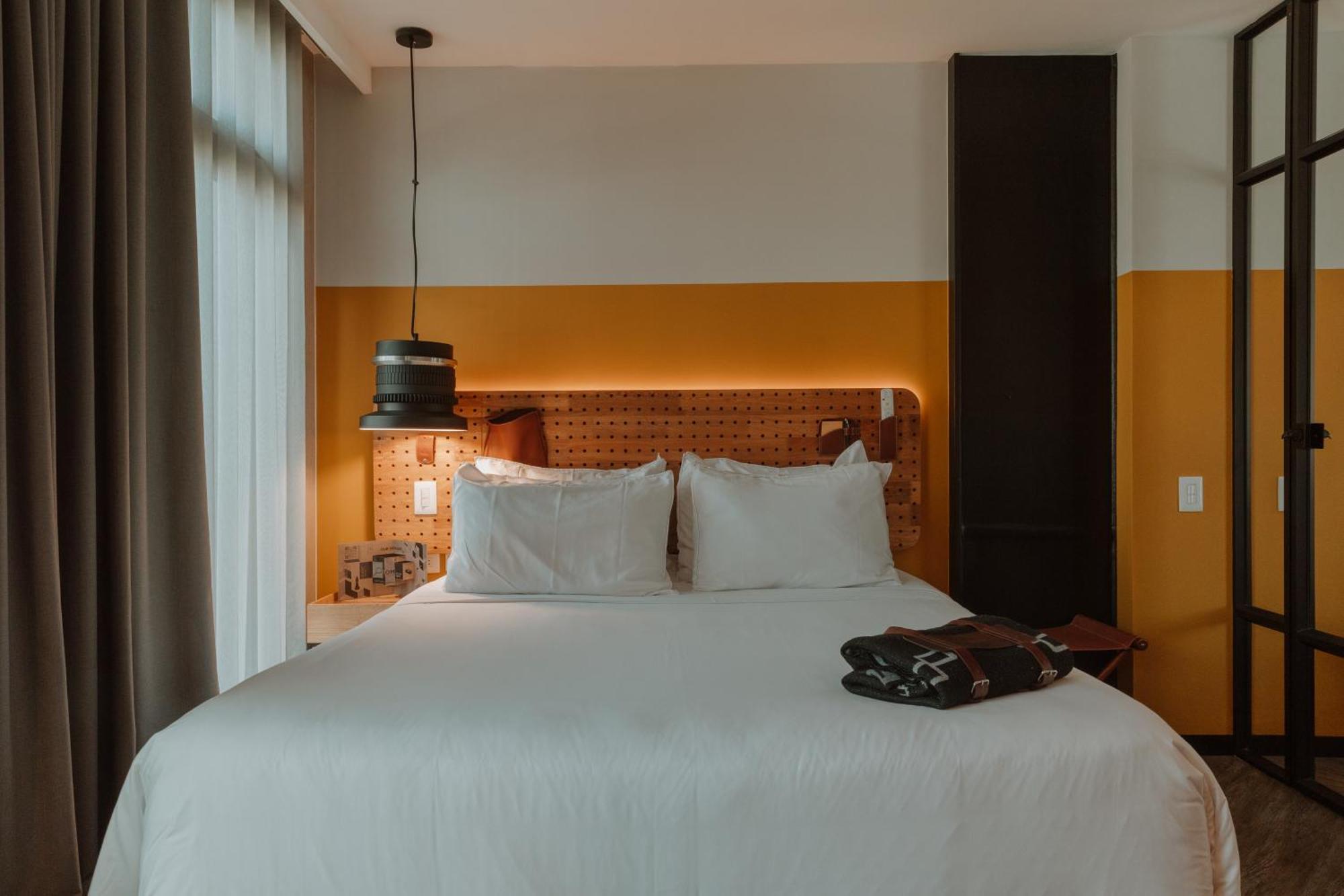 The Click Clack Hotel Medellín Exteriör bild A room at the hotel